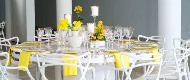white chairs with yellow decorations